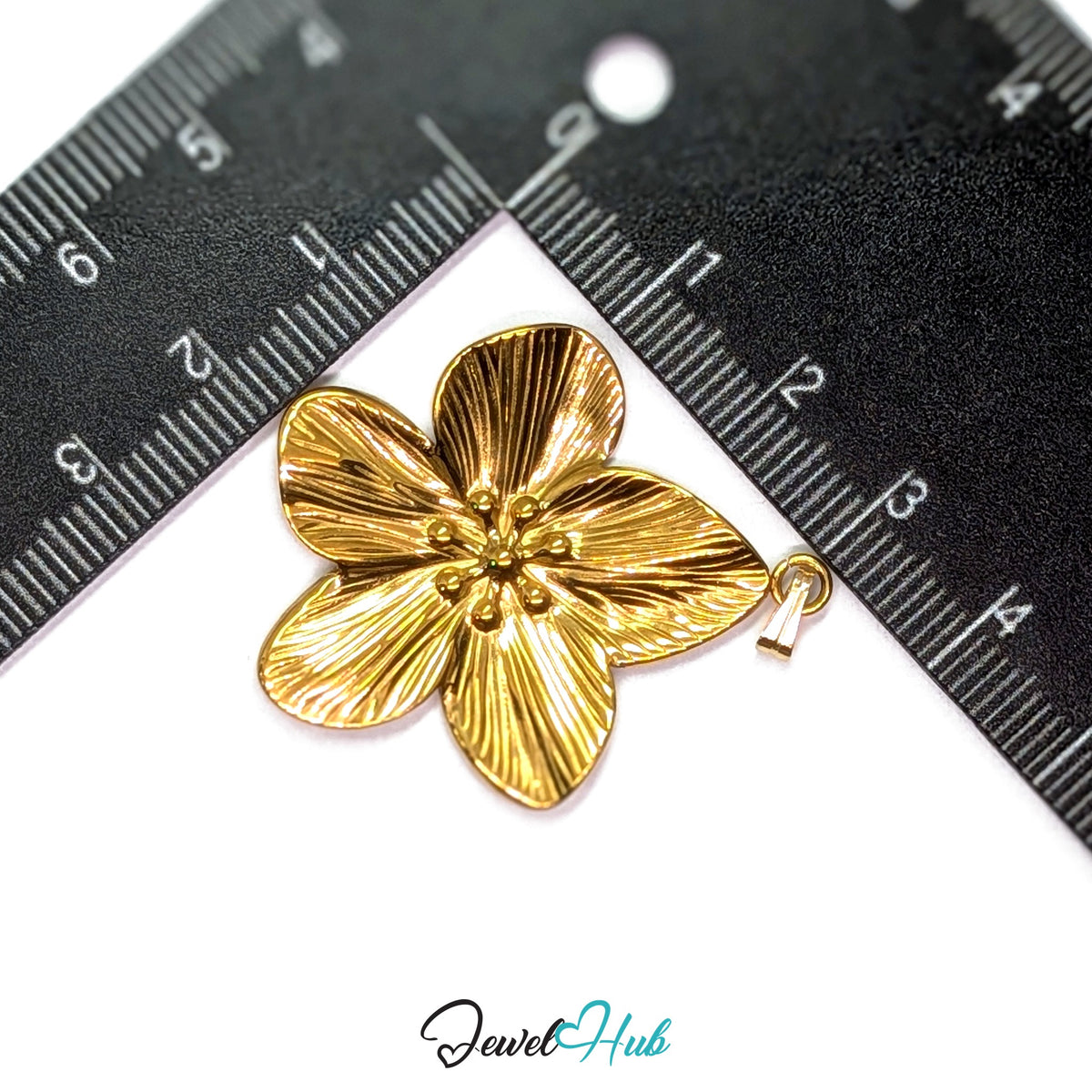 Gold Five Petal Flower pendant in gold-tone stainless steel - measurement with ruler - JewelHub