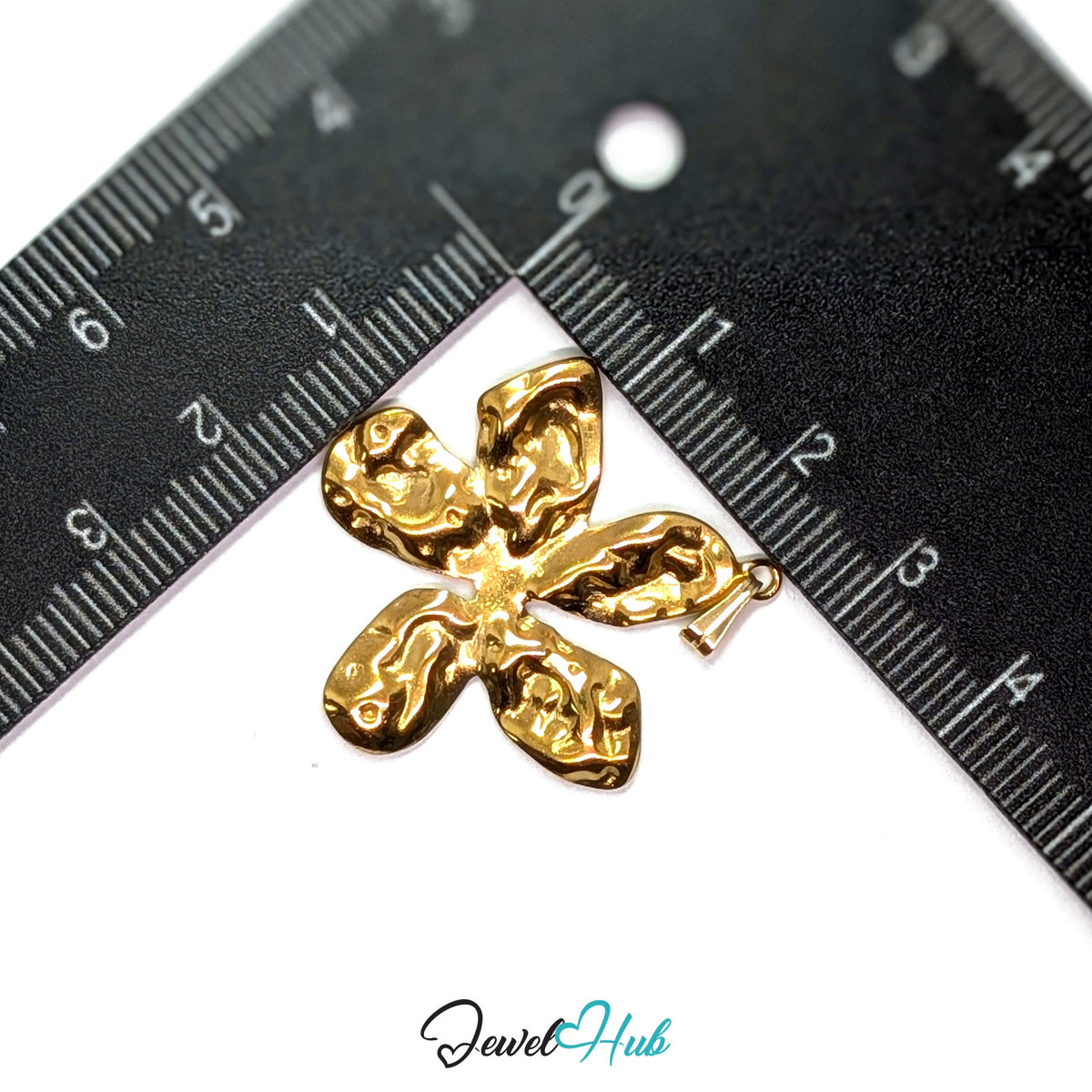 Gold Organic Petal Flower pendant in gold-tone stainless steel - measurement with ruler - JewelHub