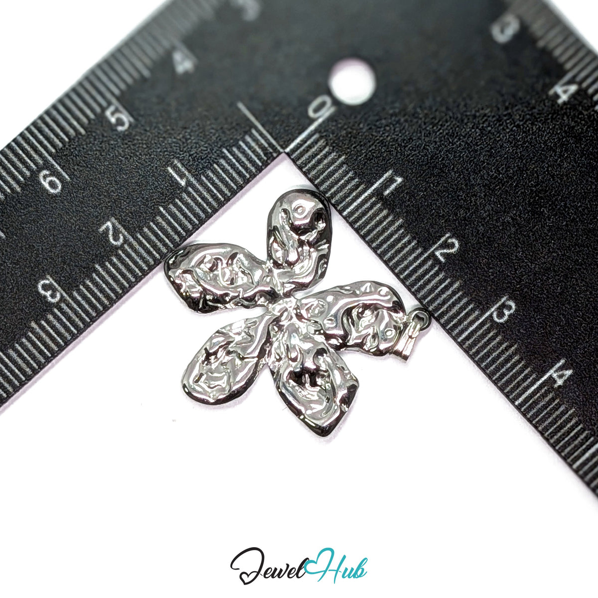Silver Organic Petal Flower pendant in silver-tone stainless steel - measurement with ruler - JewelHub