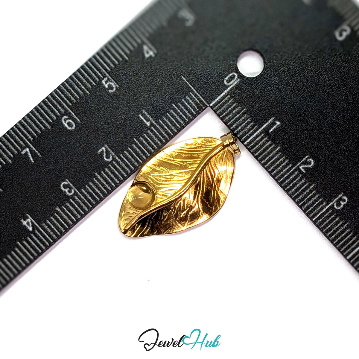 Gold Dewdrop Leaf pendant in gold-tone stainless steel - measurement with ruler - JewelHub