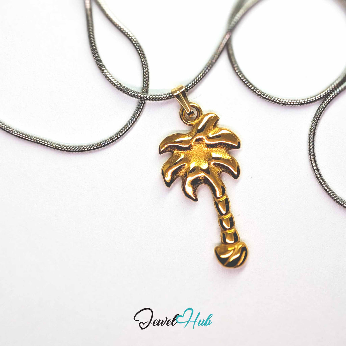 Gold Palm Tree pendant in gold-tone stainless steel - on a silver-tone stainless steel chain - JewelHub