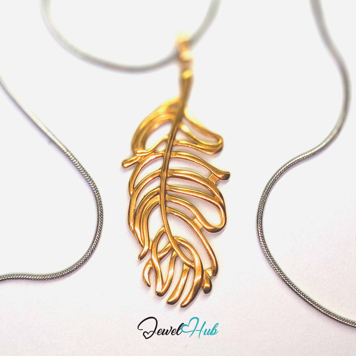 Gold Feather Leaf pendant in gold-tone stainless steel - on a silver-tone stainless steel chain - JewelHub