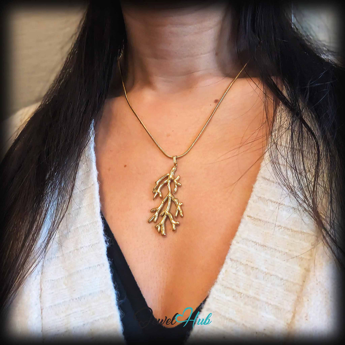 Gold Coral Seaweed pendant in gold-tone stainless steel - worn on the neck - JewelHub
