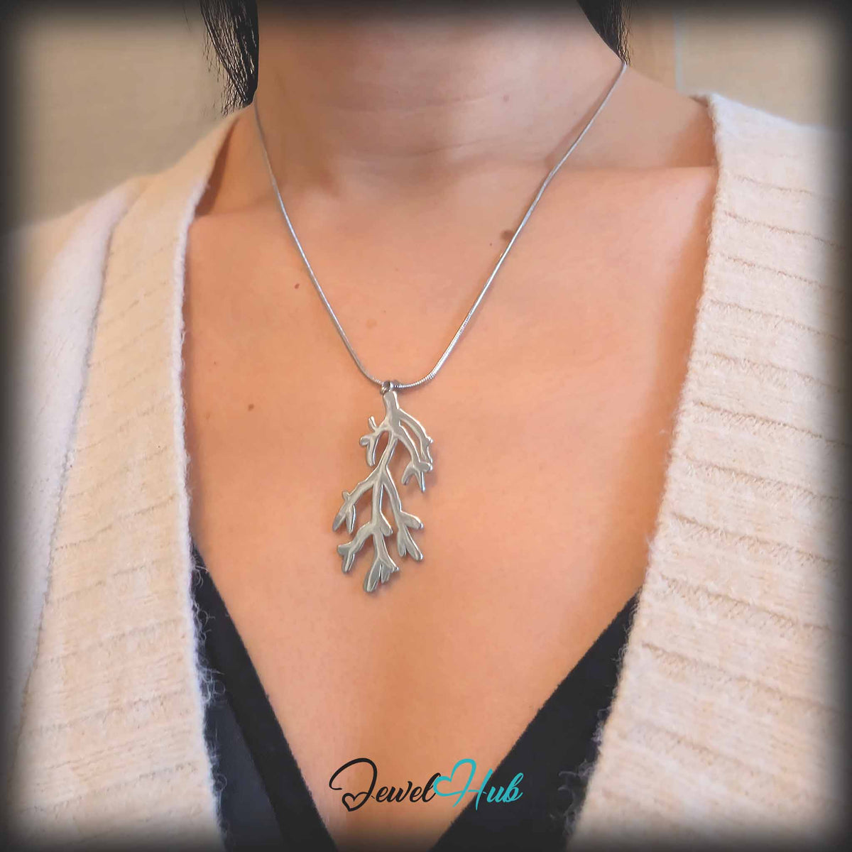 Silver Coral Seaweed pendant in silver-tone stainless steel - worn on the neck - JewelHub