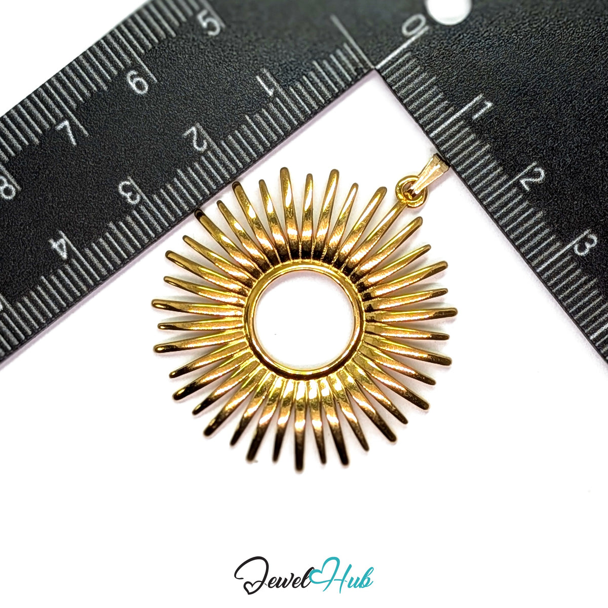Gold Giant Sun pendant in gold-tone stainless steel - measurement with ruler - JewelHub