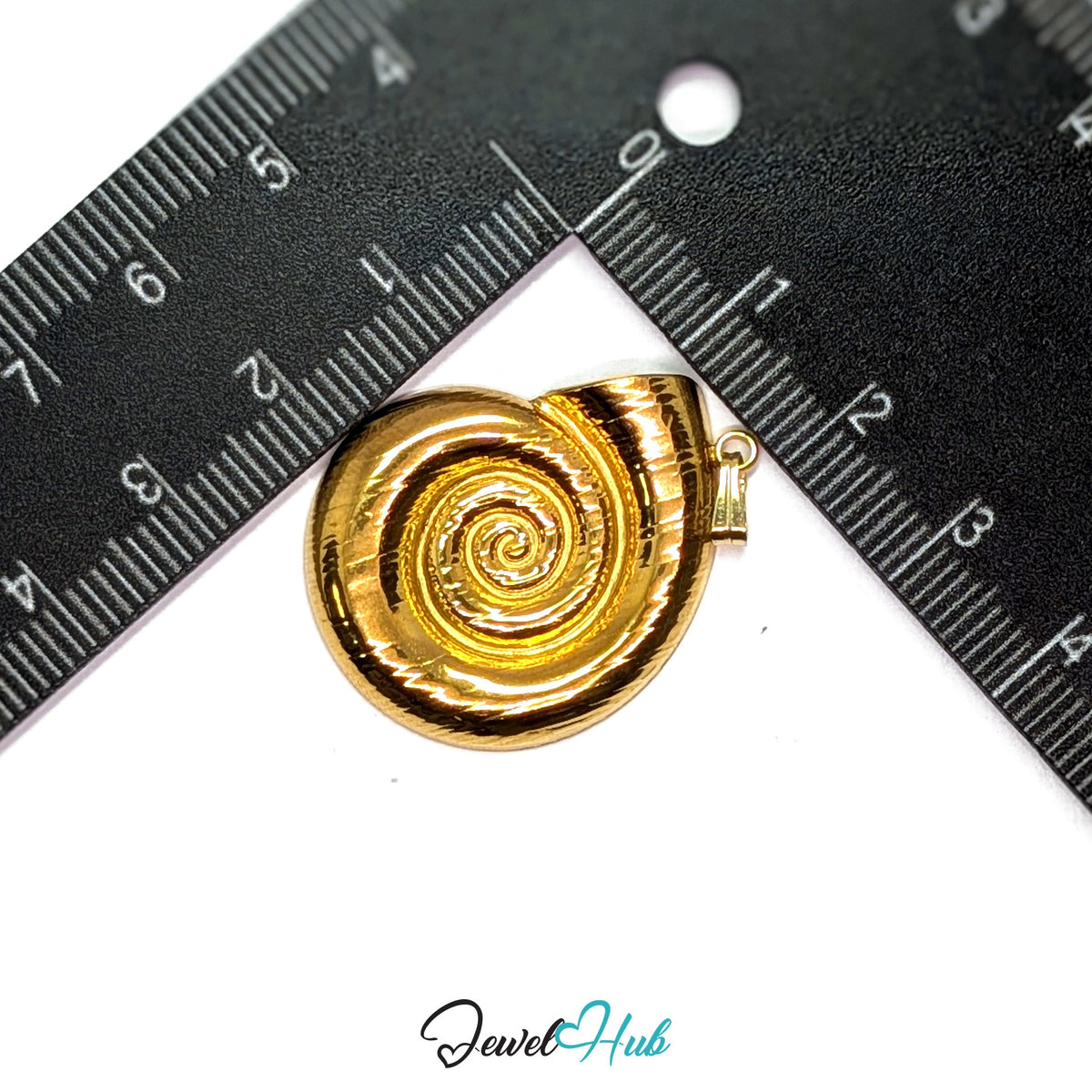 Gold Spiral Shell pendant in gold-tone stainless steel - measurement with ruler - JewelHub