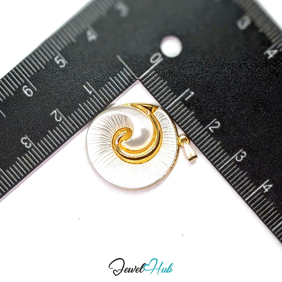 Pearl Spiral Shell pendant in gold-tone stainless steel - measurement with ruler - JewelHub