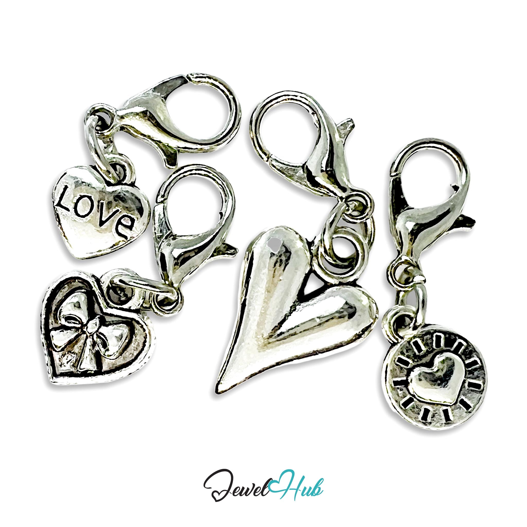 Set of silver heart-shaped charms with 'LOVE' and other designs on a white background, branded 'Jewel Hub'.