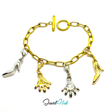 Gold bracelet with shoe and hand charm on a white background, branded 'Jewel Hub'.