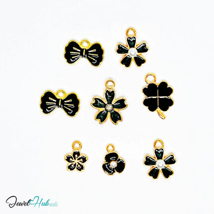 Bloom & Grace Charm Bracelet · Gold-Tone Plated · Glossy Black Floral Motifs · 19cm - JewelHub