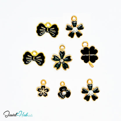 Bloom & Grace Charm Bracelet · Gold-Tone Plated · Glossy Black Floral Motifs · 19cm - JewelHub