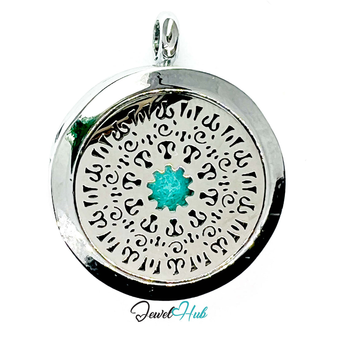 Silver pendant with intricate designs and a turquoise stone on a white background, branded 'Jewel Hub'.
