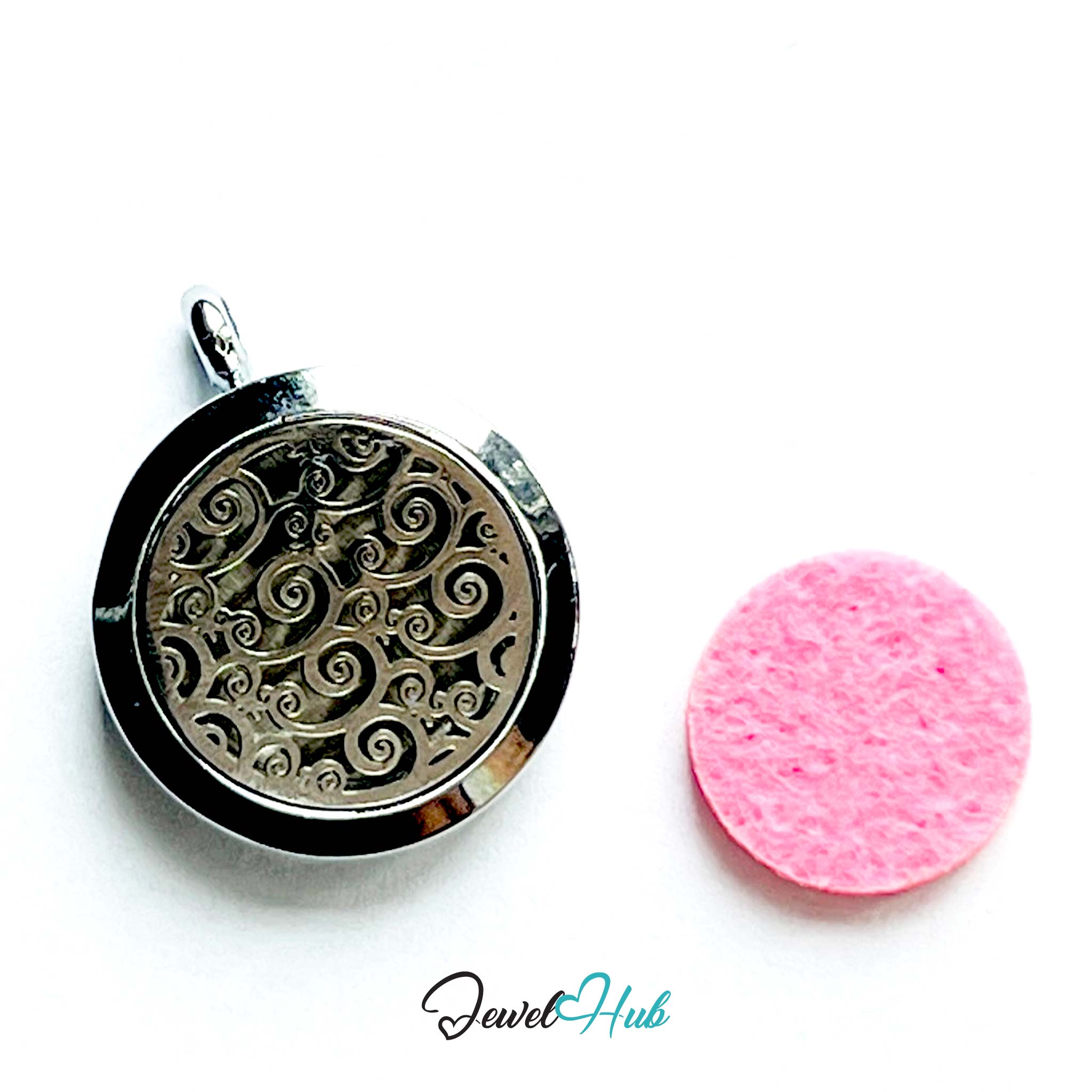 Decorative pendant with intricate design next to a pink cleaning cloth on a white background, branded 'Jewel Hub'.