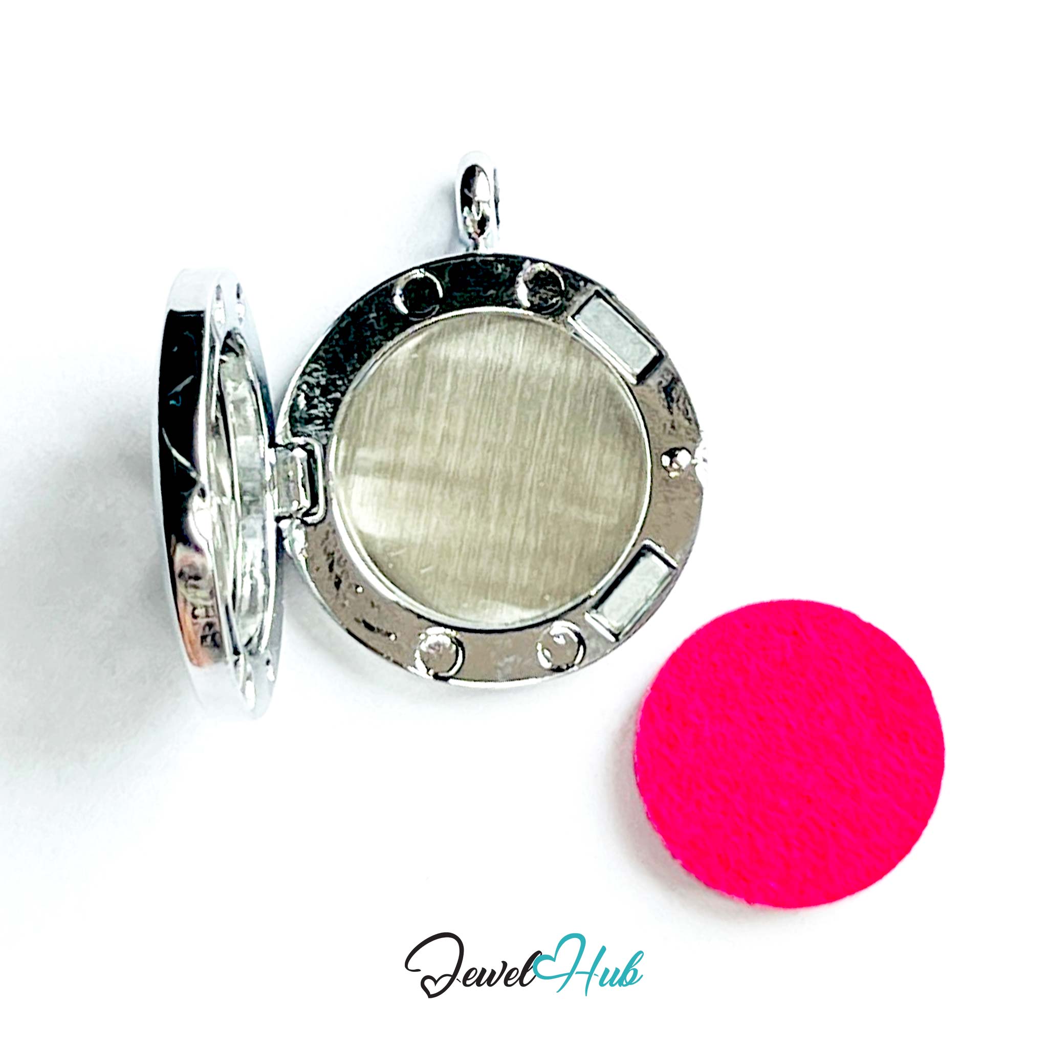Silver locket with a pink round object on a white background, branded 'Jewel Hub'.