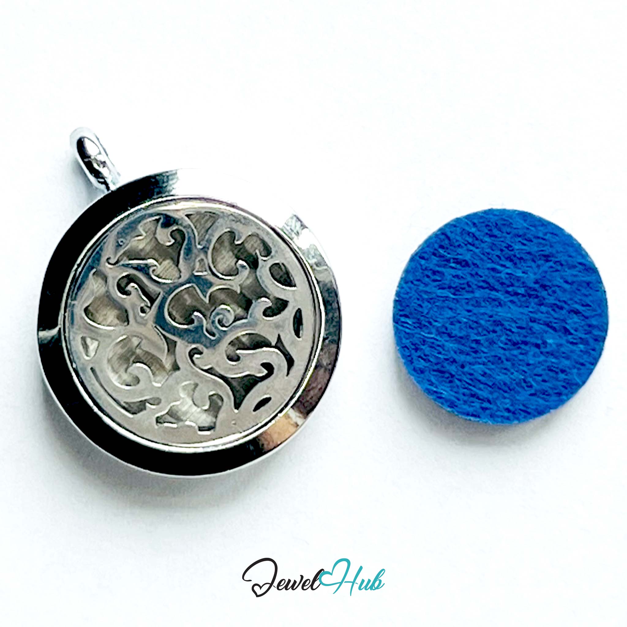 Silver locket with intricate design and blue cleaning sponge on a white background, branded 'Jewel Hub'.