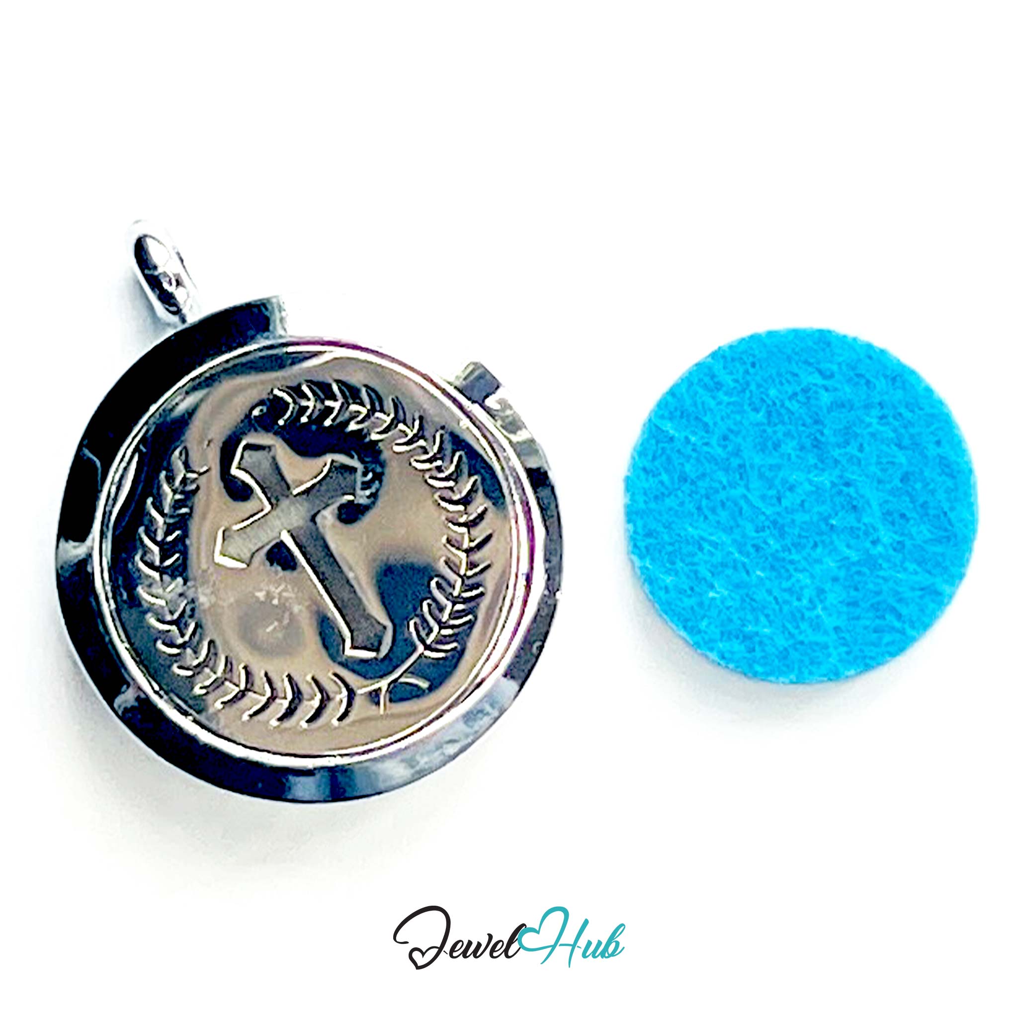 Silver pendant with cross design and blue felt ball on a white background, branded 'Jewel Hub'.