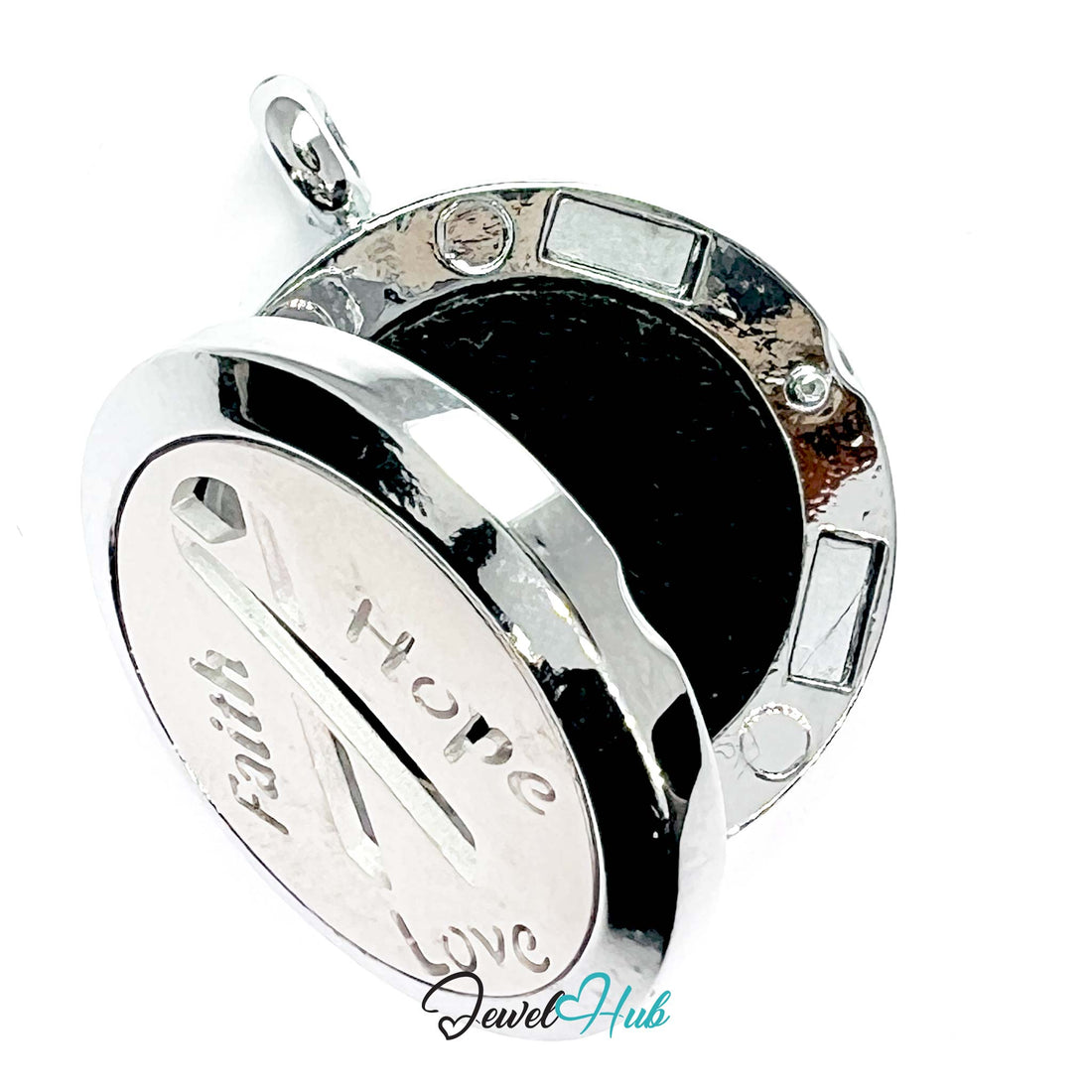 Silver pendant with black ribbon and engraved text 'Faith Hope Love' on a white background.
