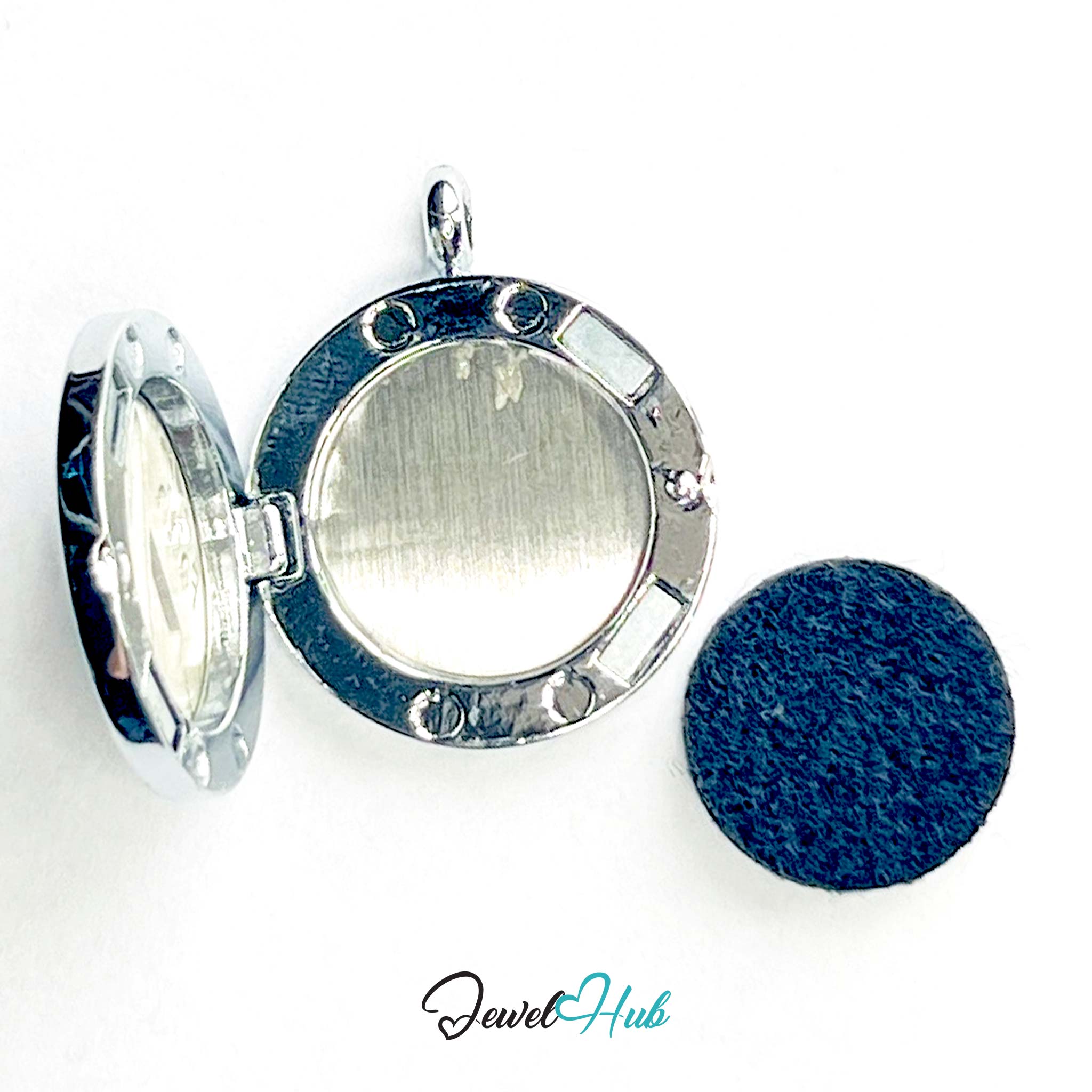 Silver locket with blue stone and matching blue fabric sphere on a white background, branded 'Jewel Hub'.