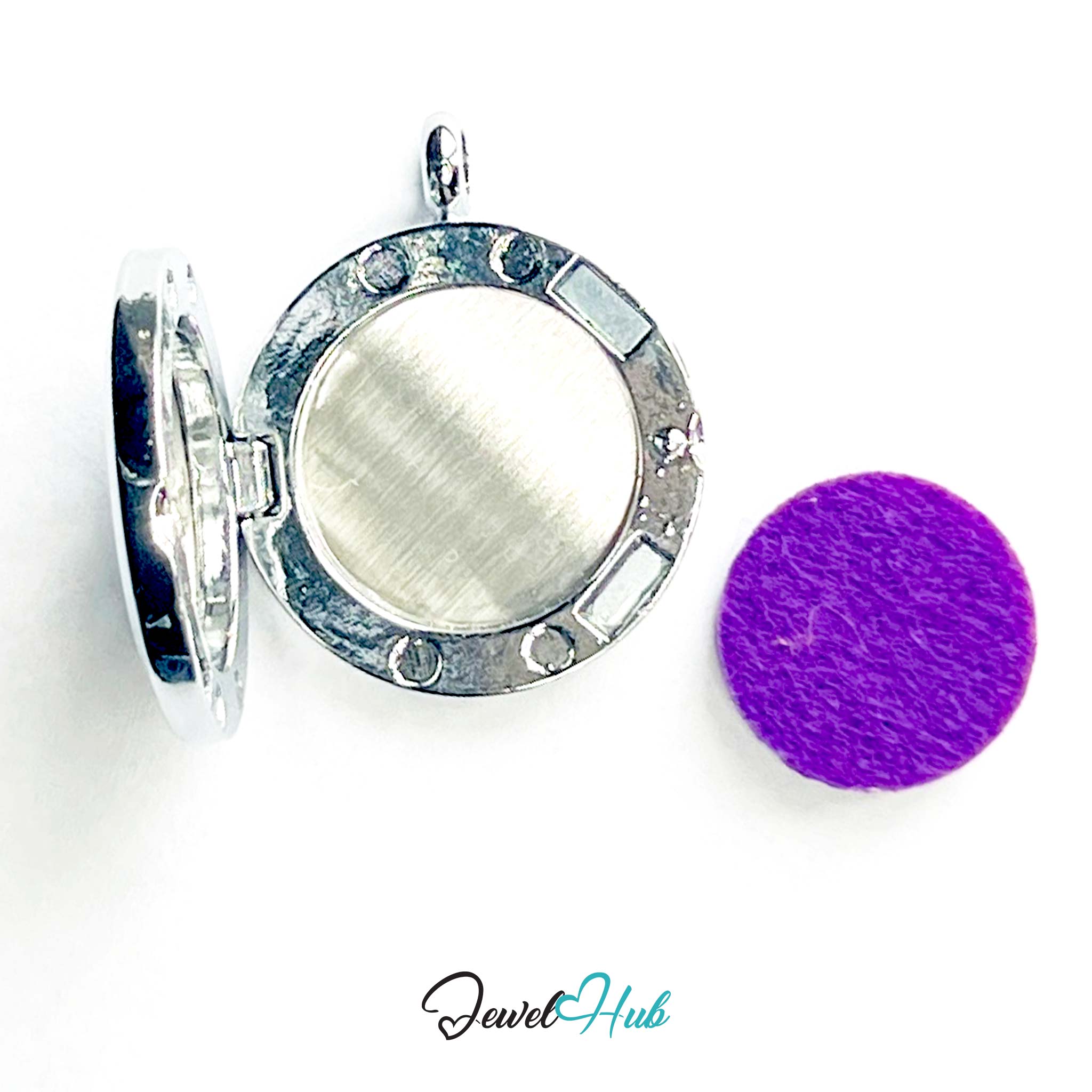 Silver locket with a purple round object on a white background, branded 'Jewel Hub'.