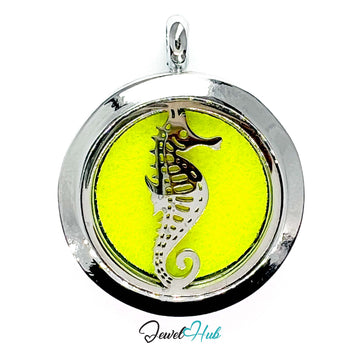 Round pendant with seahorse design on a yellow background, branded 'Jewel Hub'.