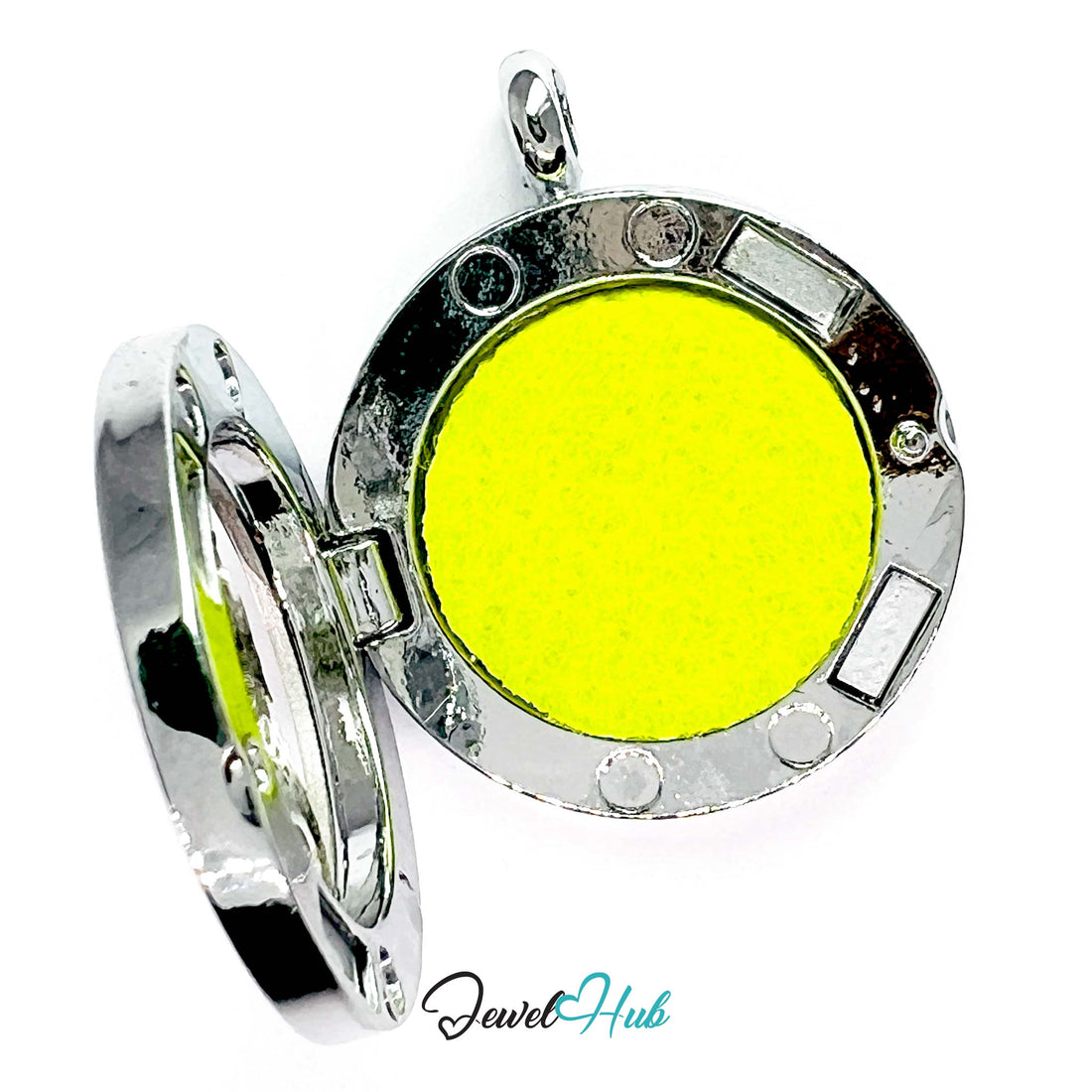 Round pendant with seahorse design on a yellow background, branded 'Jewel Hub'.