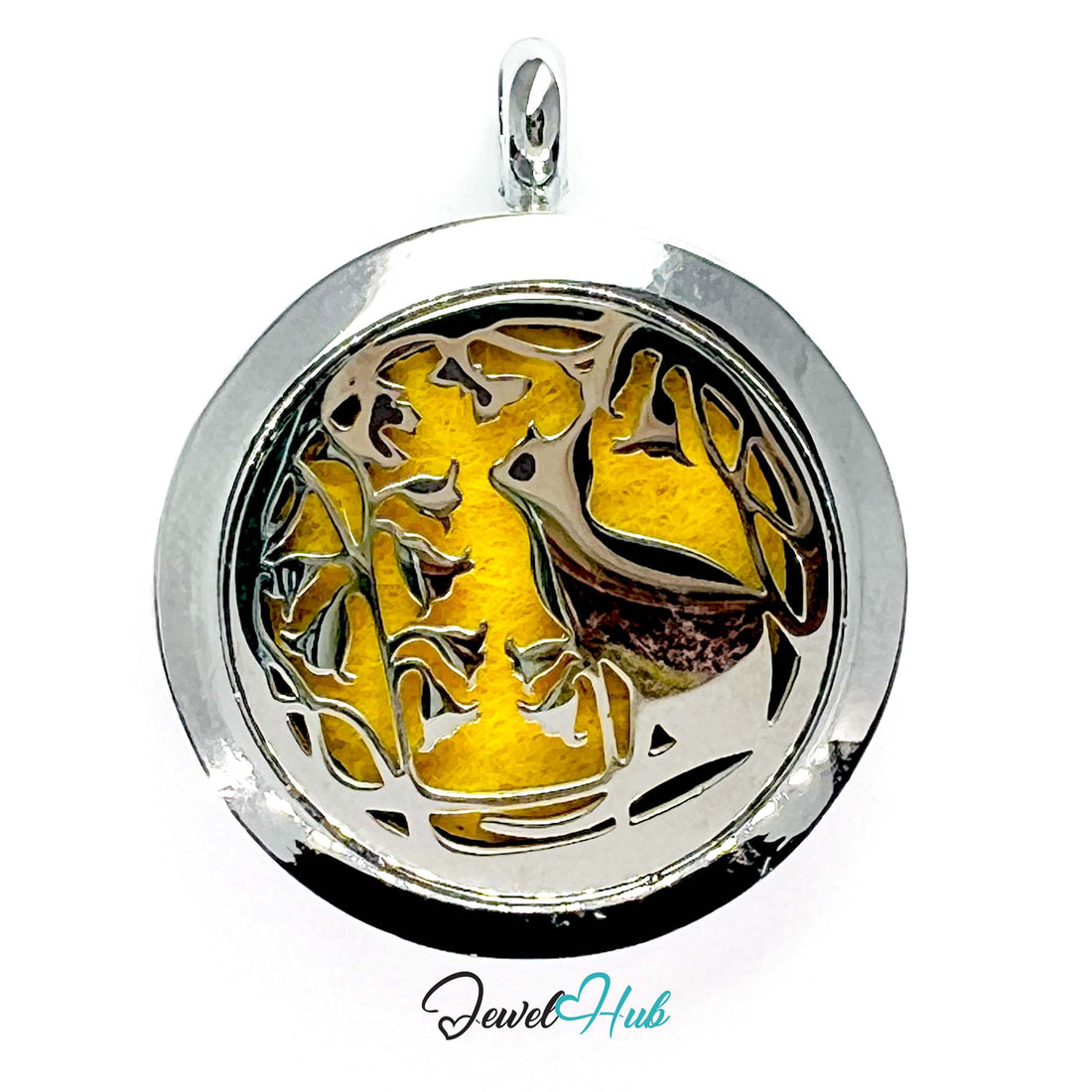 Silver pendant with gold design on a white background