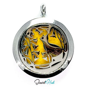 Silver pendant with gold design on a white background