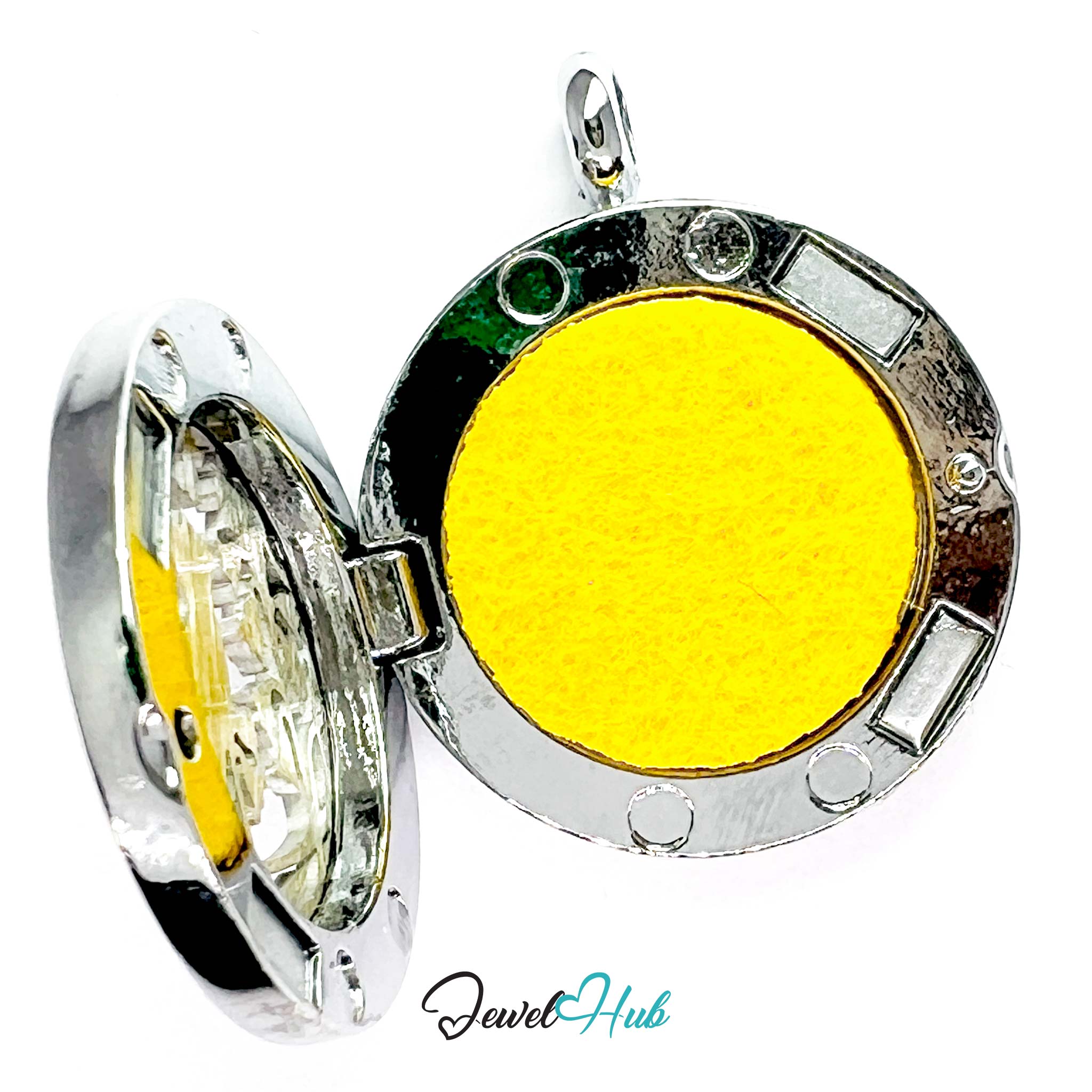 Round pendant with yellow center and silver frame on a white background, branded 'Jewel Hub'.