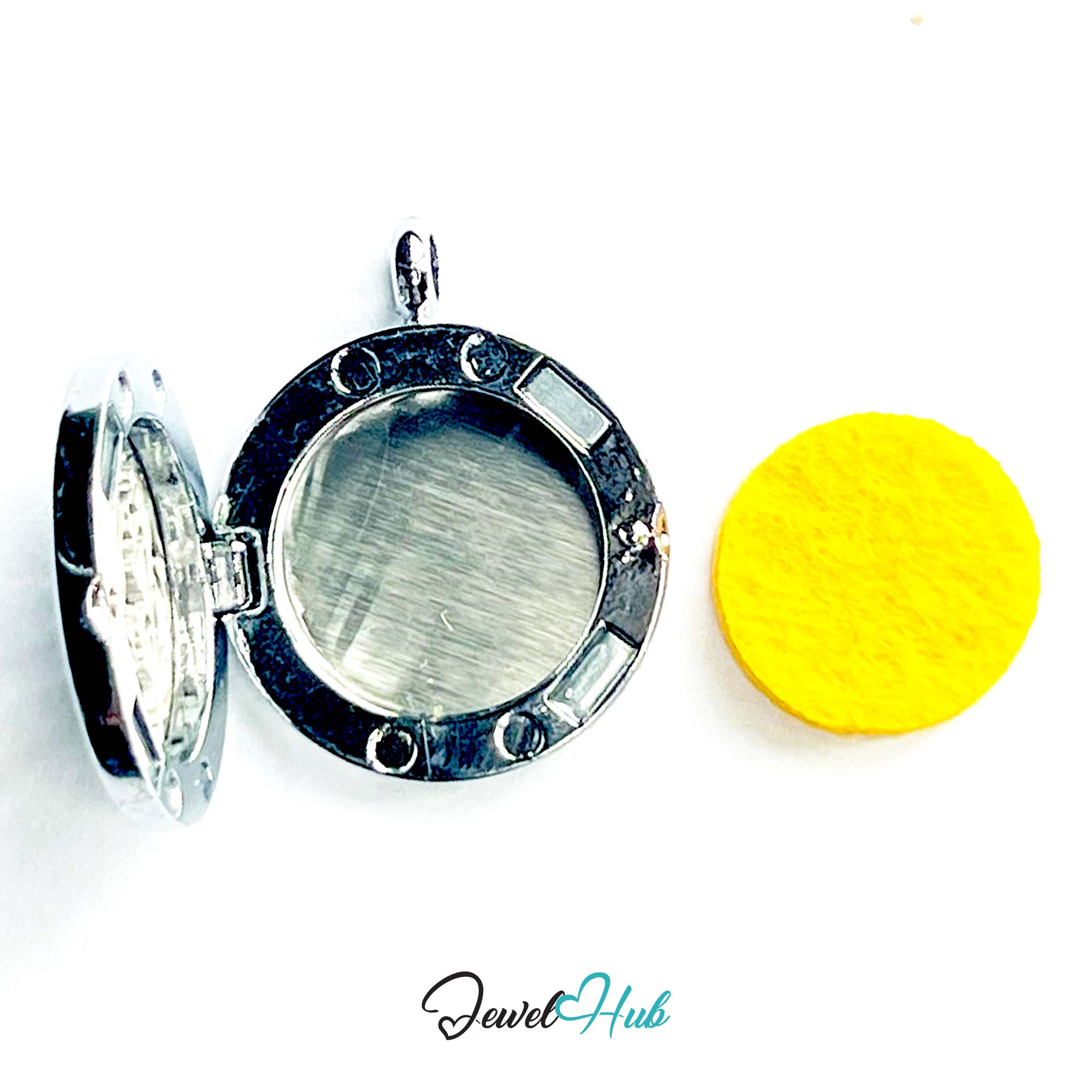 Silver locket with a yellow round object on a white background, branded 'Jewel Hub'.
