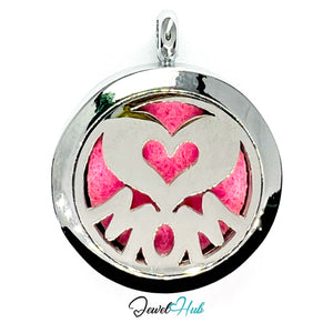 Pendant with 'Mom' and heart design on a pink background, brand 'Jewel Hub' visible