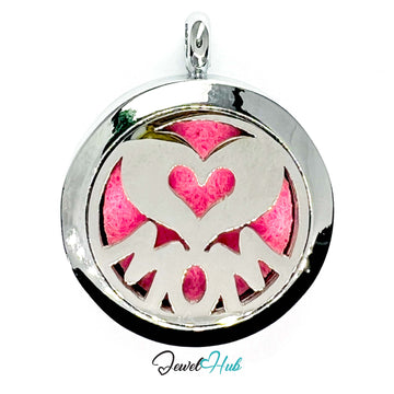 Pendant with 'Mom' and heart design on a pink background, brand 'Jewel Hub' visible