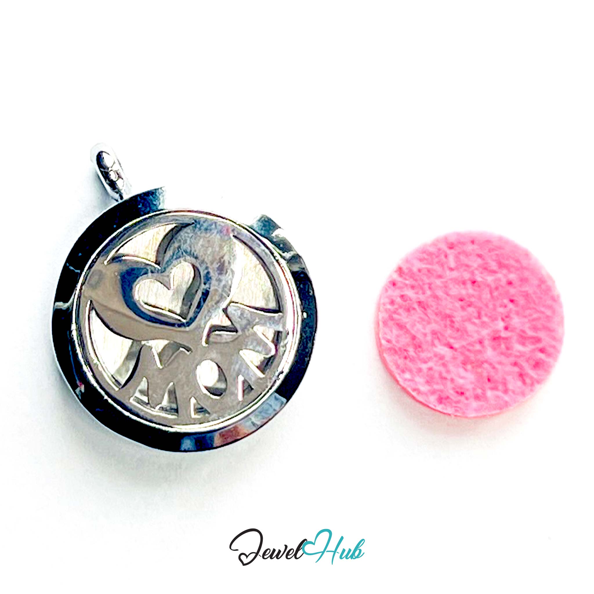 Silver locket with heart and 'Mom' cutout next to a pink round object on a white background, branded 'Jewel Hub'.