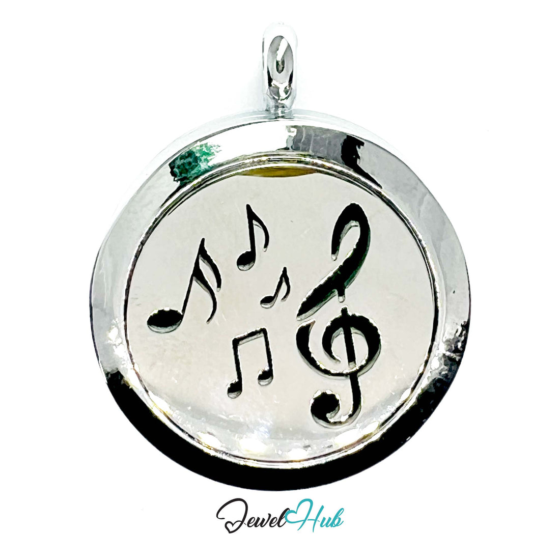 Silver pendant with musical notes on a white background