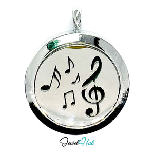 Silver pendant with musical notes on a white background