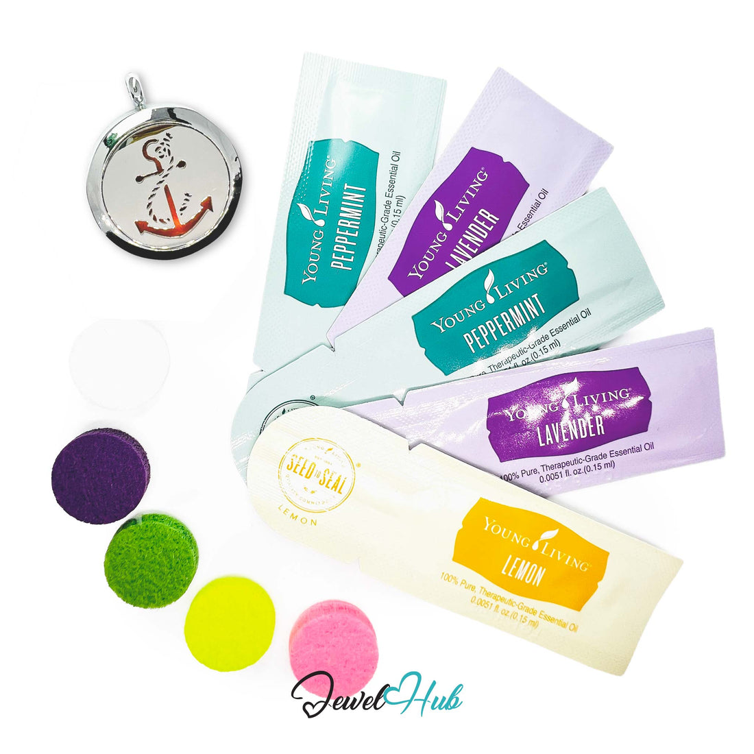Collection of Young Living essential oil packets and a locket on a white background