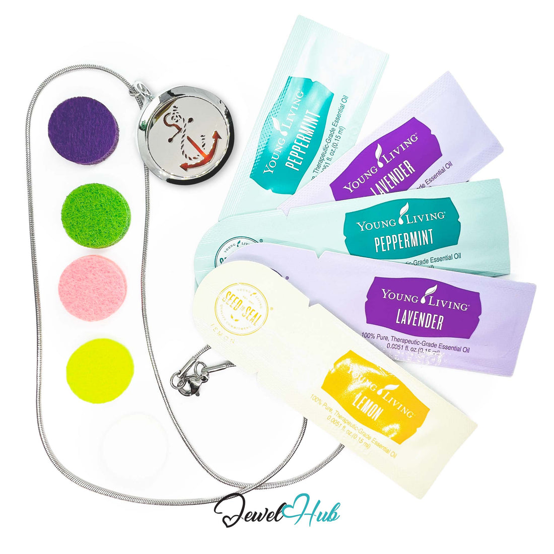 Colorful pocket watch with Young Living essential oil packets on a white background