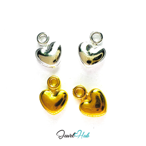 Heart-shaped gold and silver earrings on a white background with 'Jewel Hub' branding.