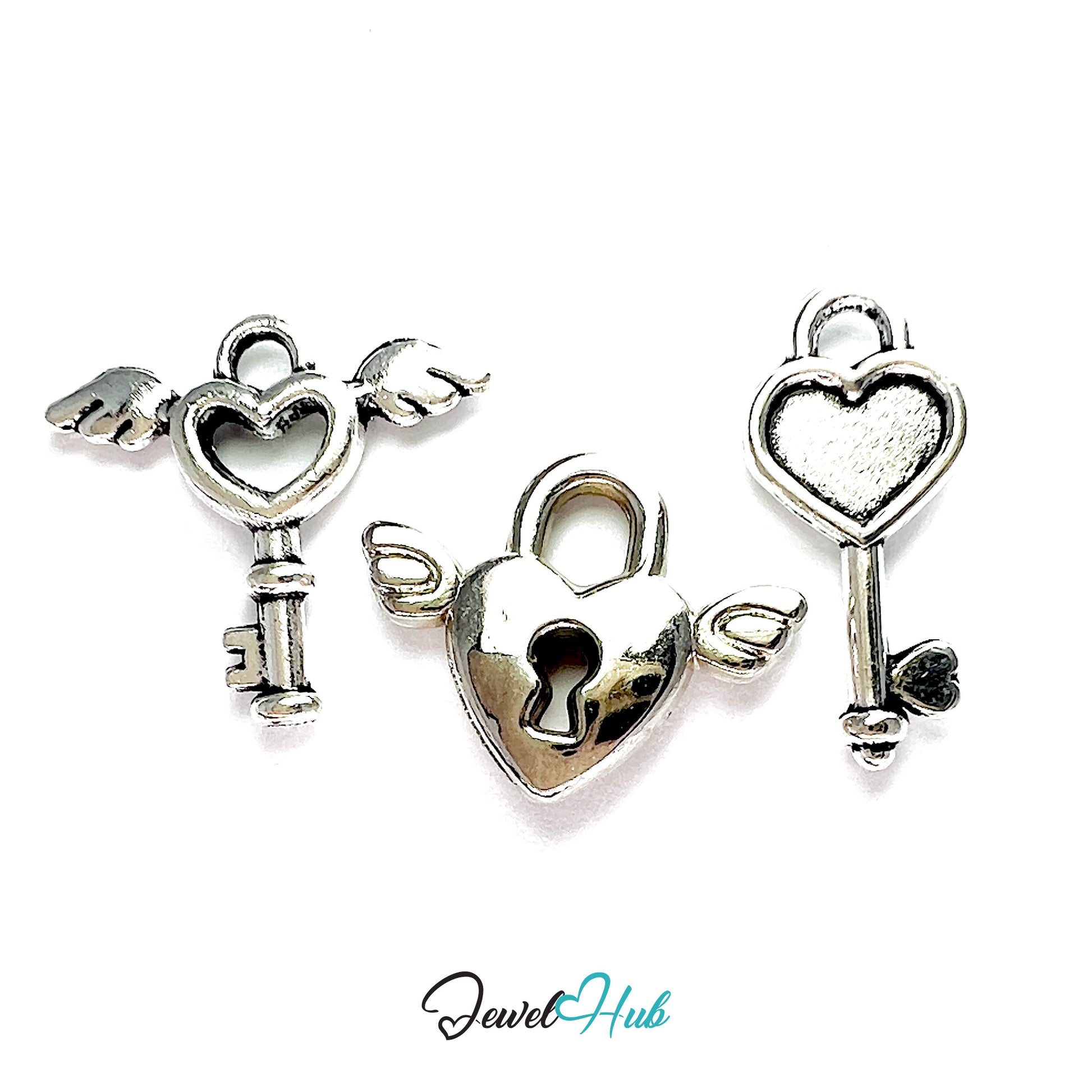 Three silver heart-shaped key pendants on a white background with 'Jewel Hub' branding.