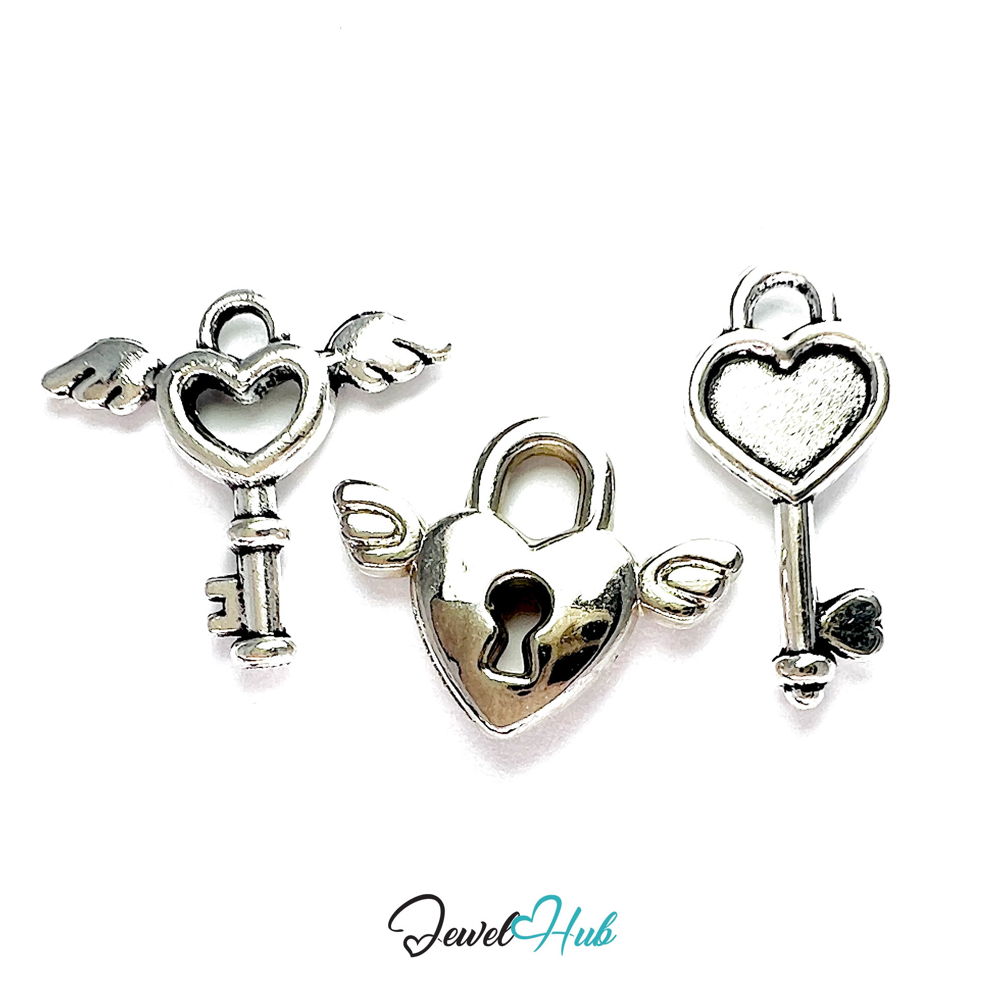 Three silver heart-shaped key pendants on a white background with 'Jewel Hub' branding.