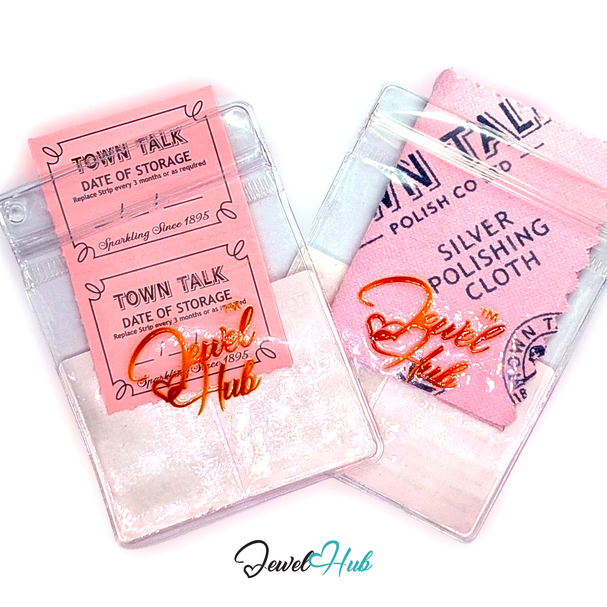 JewelHub silver polishing kit containing a clear plastic case with pink 'Town Talk Date of Storage' labels, a pink polishing cloth, and a small metal brush, displayed on a white background.