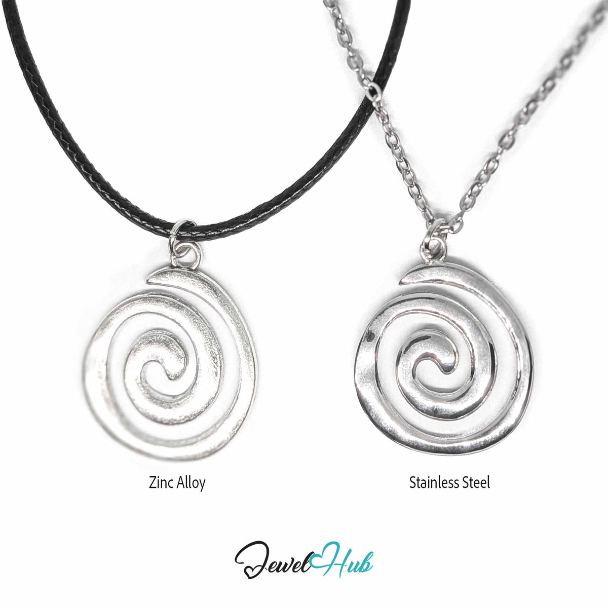 Two spiral pendant necklaces on a white background, labeled 'Zinc Alloy' and 'Stainless Steel.' The left necklace has a black cord and a silver-toned spiral pendant, while the right necklace has a silver chain and a matching silver-toned spiral pendant.