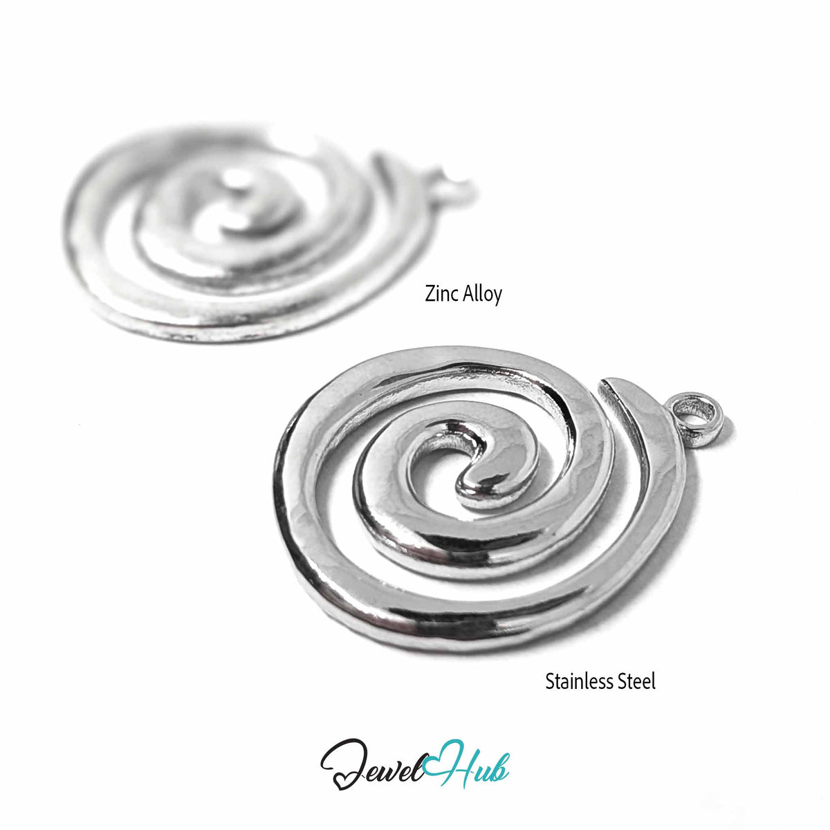 Two spiral-shaped jewelry pendants on a white background, labeled 'Zinc Alloy' and 'Stainless Steel,' with the JewelHub logo at the bottom.