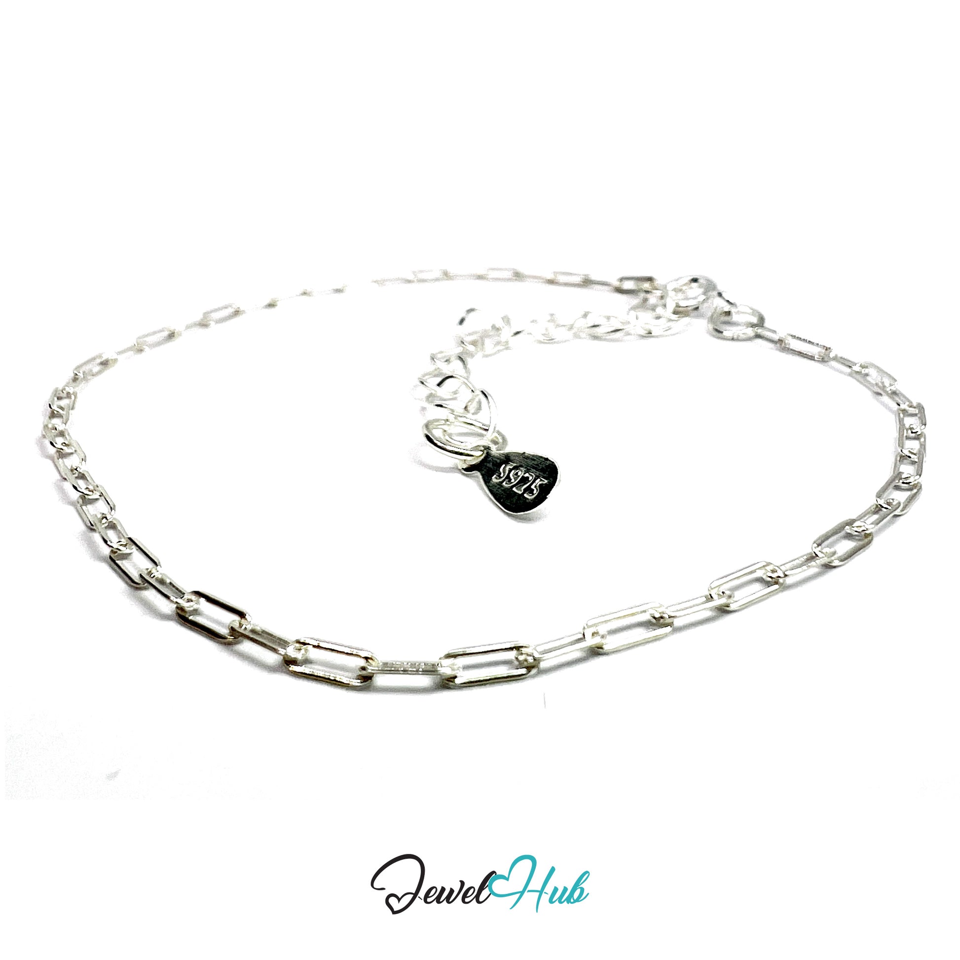 Silver chain bracelet with a heart-shaped tag on a white background, branded 'Jewel Hub'.