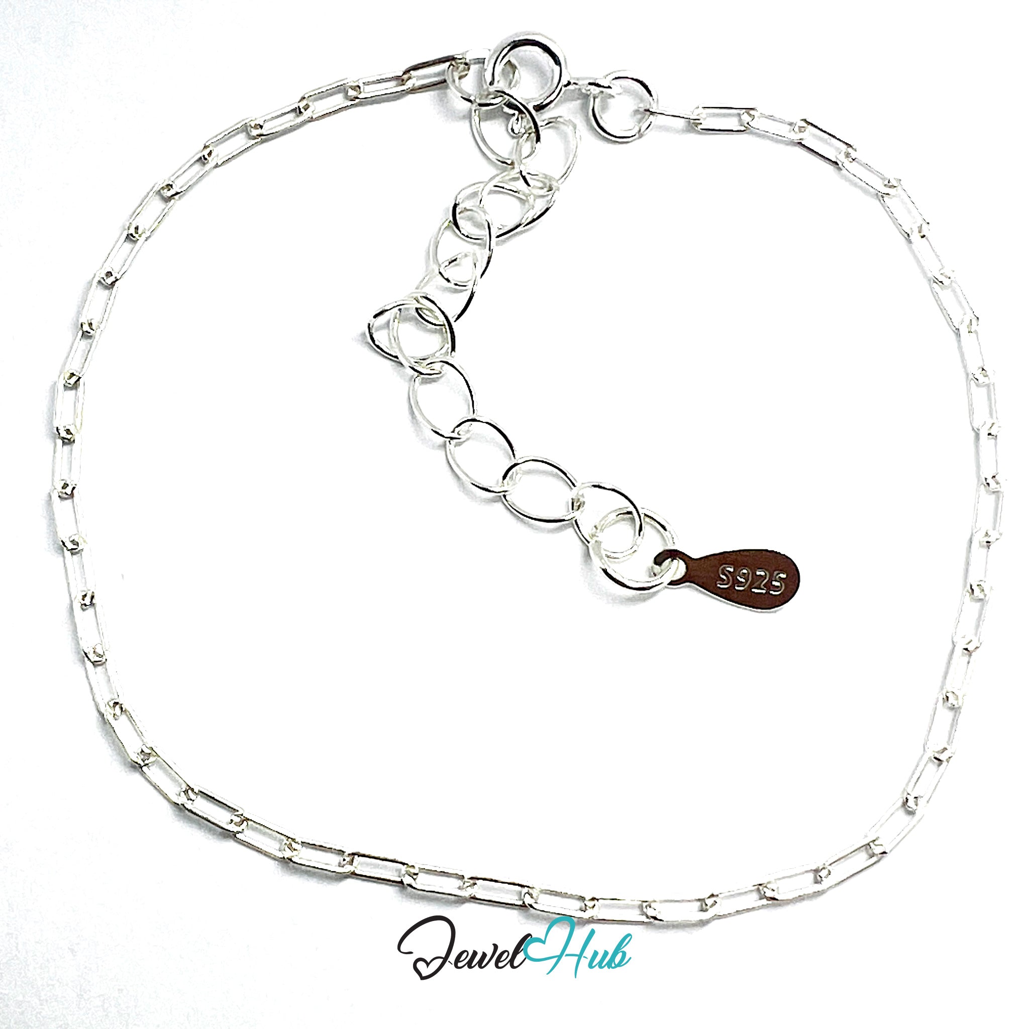 Silver chain bracelet with a brown leather tag on a white background, branded 'Jewel Hub'.