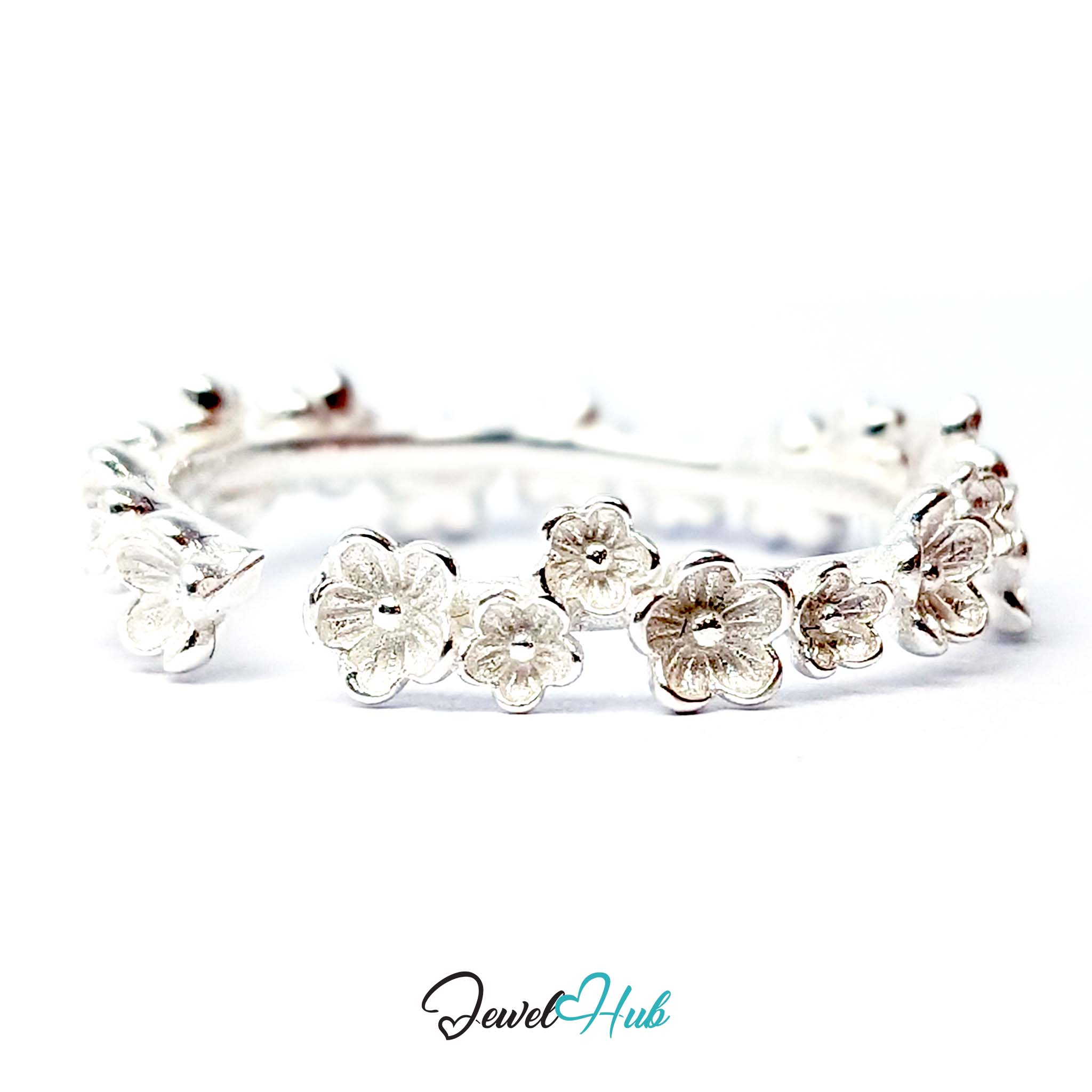 Side view of the 4.6mm Blossom Band Ring in 999 fine silver