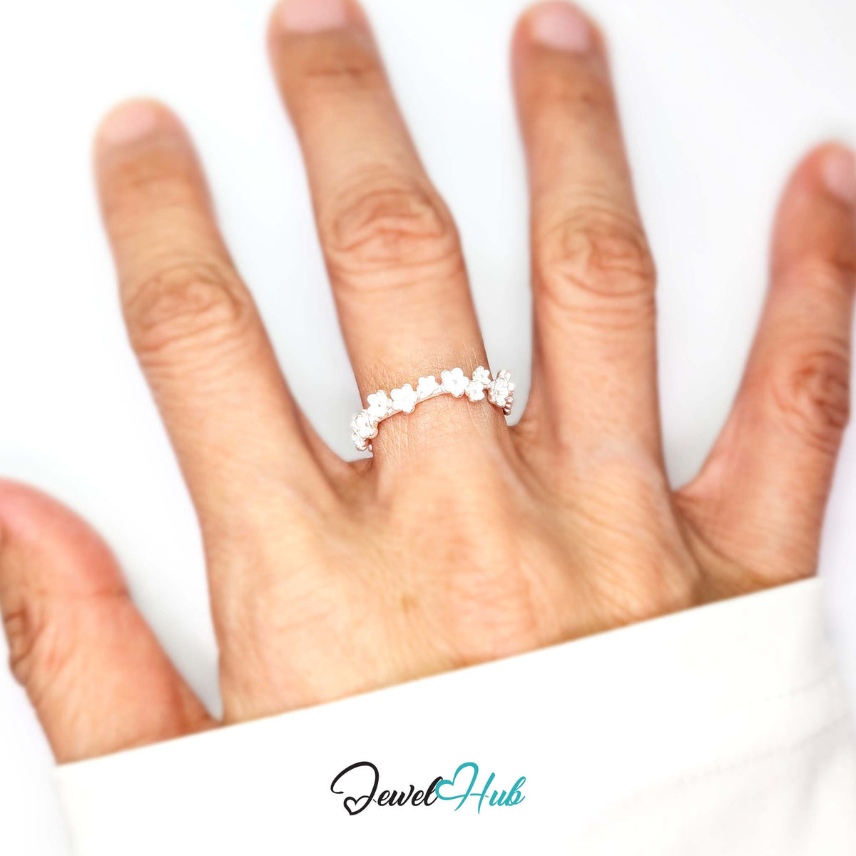 Blossom Band Ring worn on a hand, showing the fit of the adjustable M-O band
