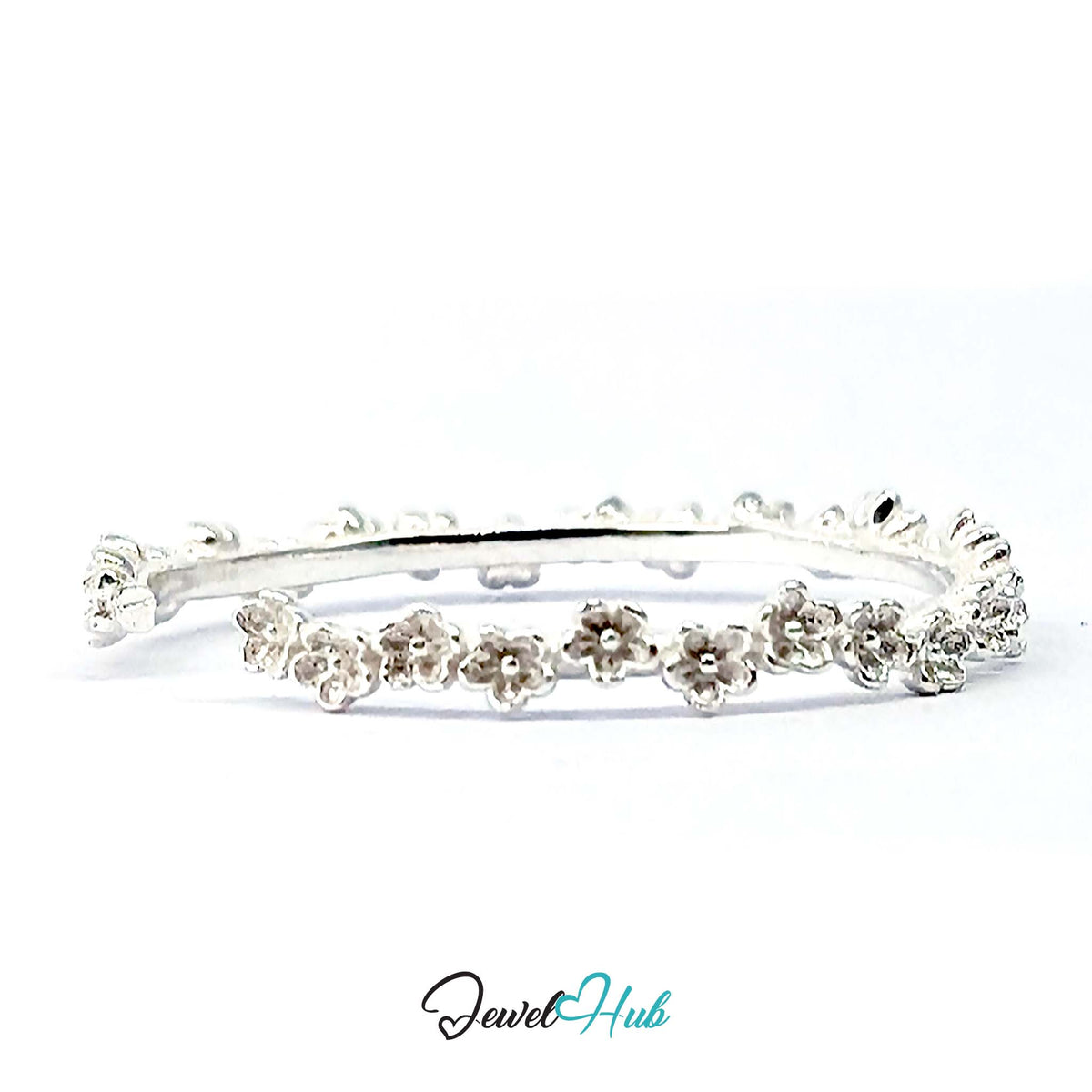 Row of miniature blossoms along the 2.5mm fine silver band