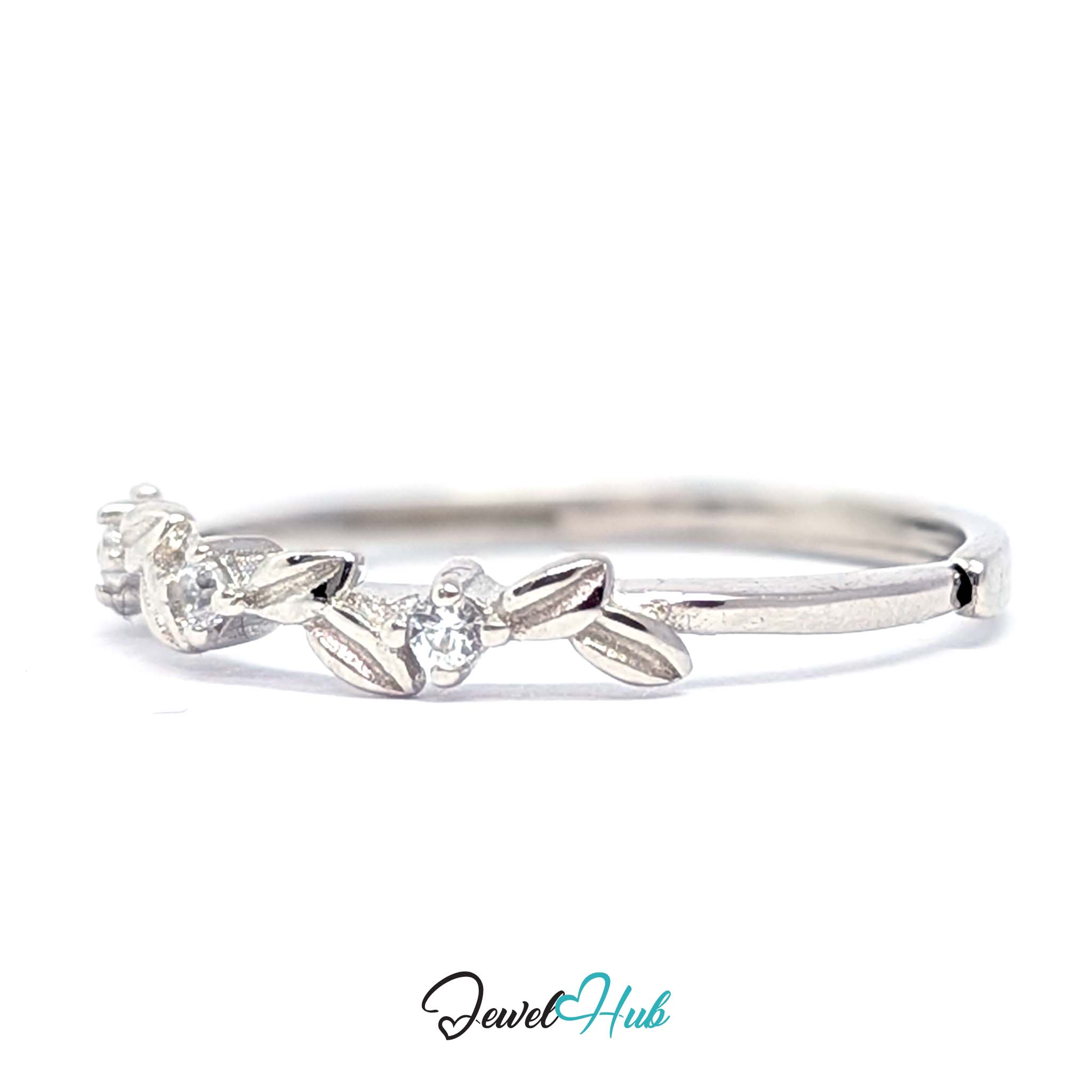 Leaf Vine Ring at an angle, showing the polished 3mm band and the set stones