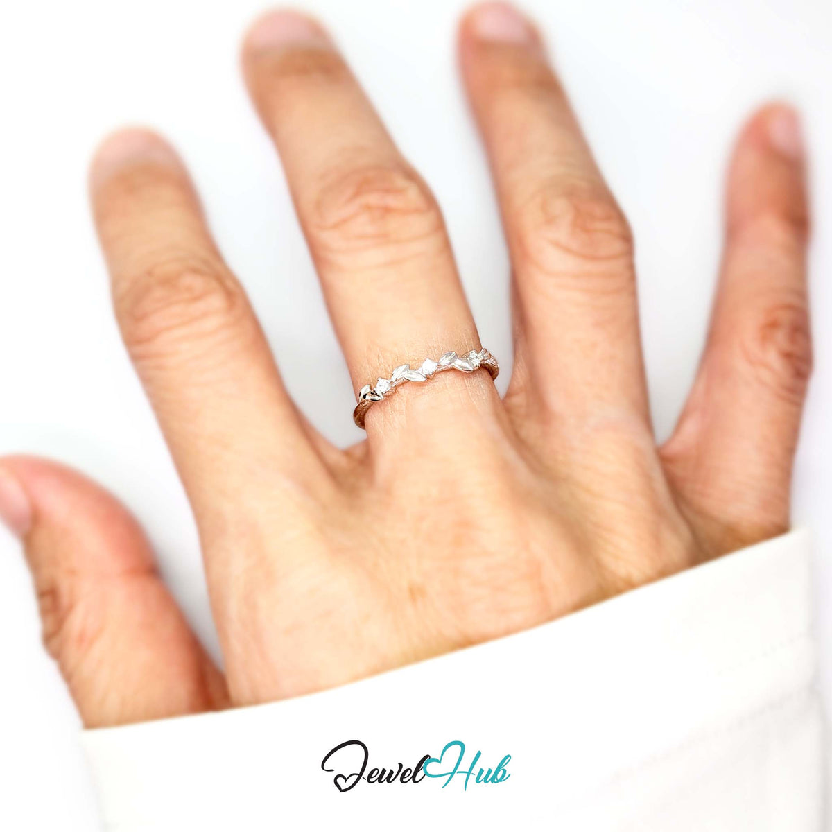 Leaf Vine Ring worn on a hand, showing the fit of the adjustable M-O band