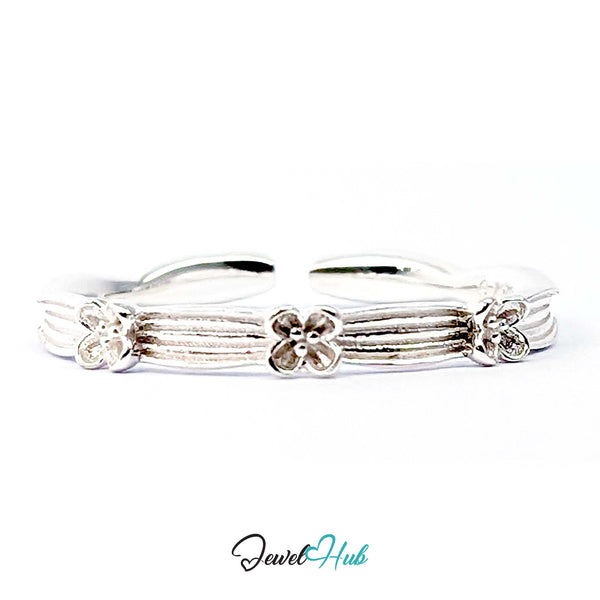 Flower Band Ring in 925 sterling silver, ribbed band with small flowers, front view